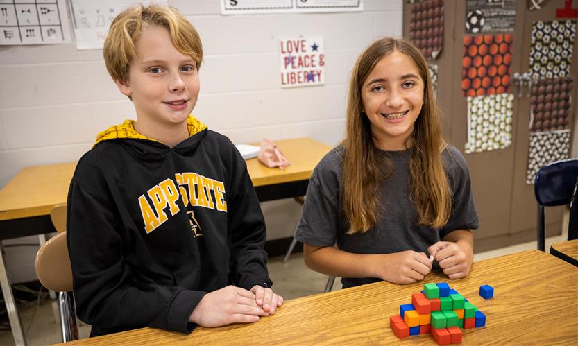 Students make pyramids out of various materials